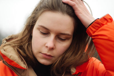 Portrait of young woman outdoors