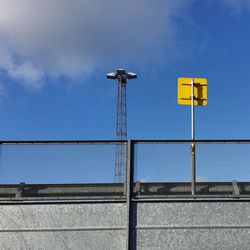 Low angle view of street light against sky