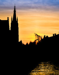 Silhouette of buildings at sunset