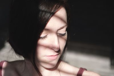 Close-up portrait of young woman