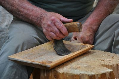 Midsection of man working