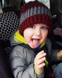 Portrait of cute baby girl in hat