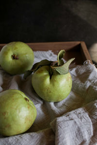 Close-up of apples on table