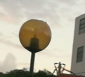 Low angle view of balloons against sky