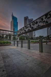 View of buildings against cloudy sky