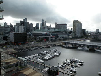 High angle view of buildings and city against sky