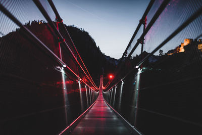 View of suspension bridge at night