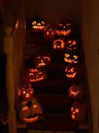 Illuminated lanterns in dark room