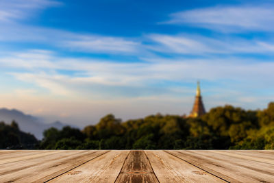 Scenic view of building against cloudy sky