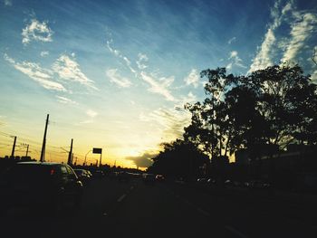 Road against sky at sunset