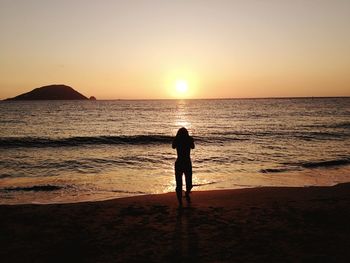 Scenic view of sea at sunset