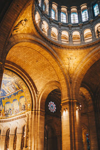 Low angle view of illuminated ceiling of building