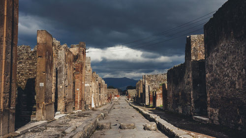 Panoramic view of old ruins against sky