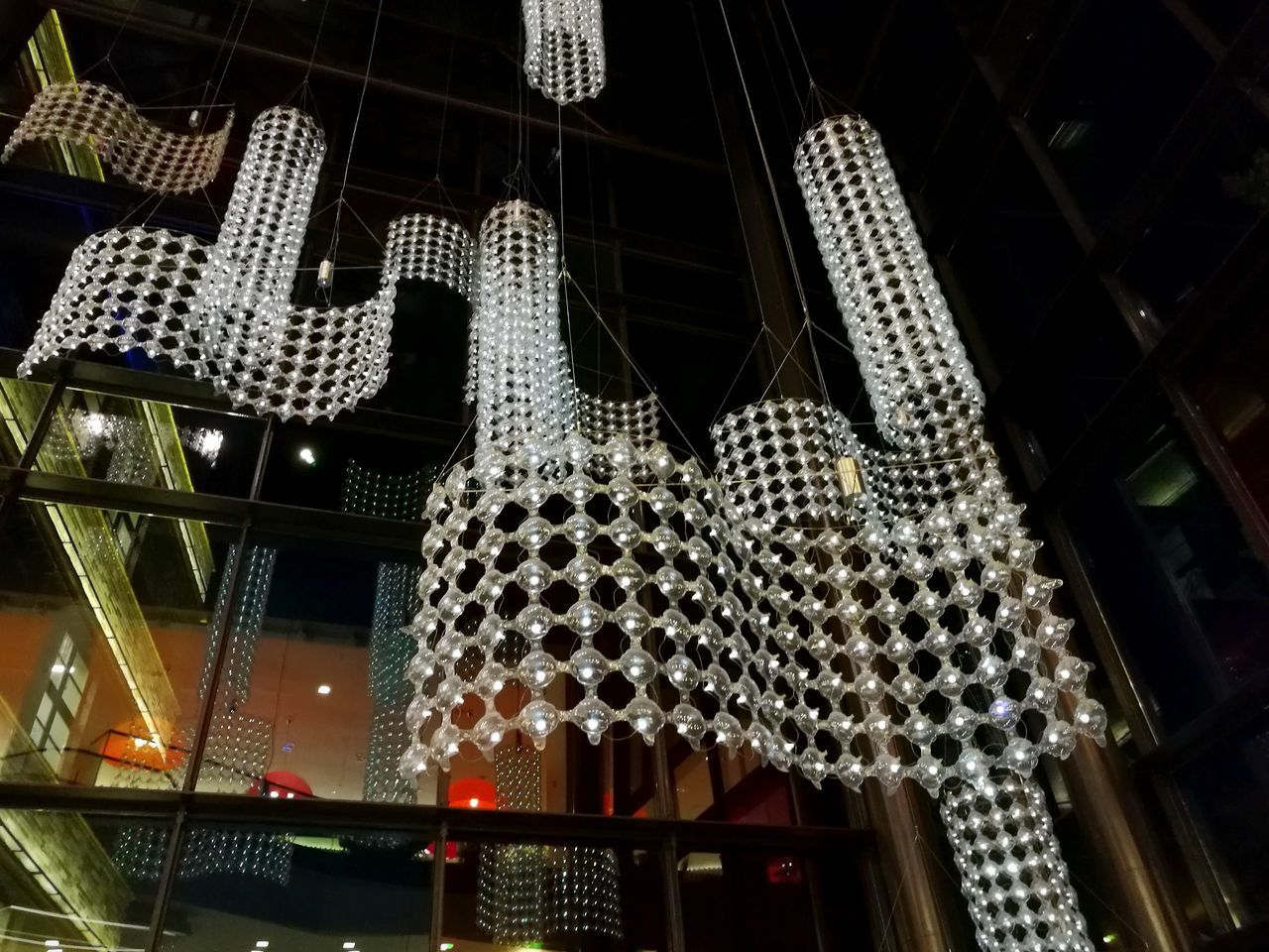 LOW ANGLE VIEW OF CHRISTMAS LIGHTS HANGING ON CEILING