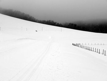 Scenic snowy mountain panorama on a leaden day