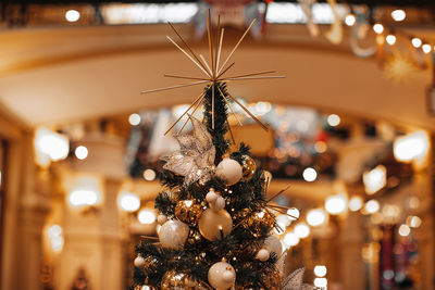 Magic cozy details, festive bokeh garland background. christmas tree 