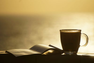 Close-up of coffee cup on table