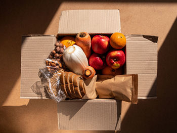 High angle view of fruits in box on table