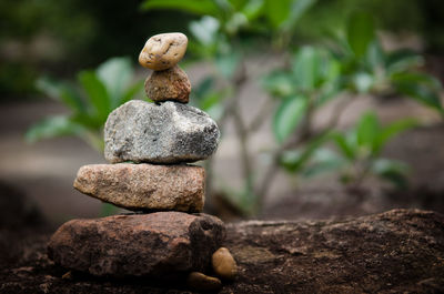 Close-up of stone stack on rock