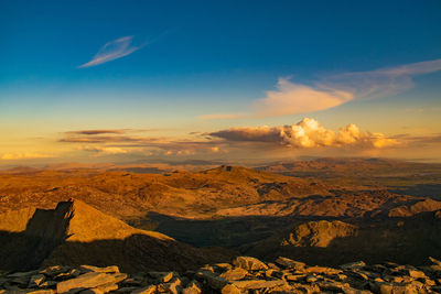 Scenic view of landscape against sky during sunset