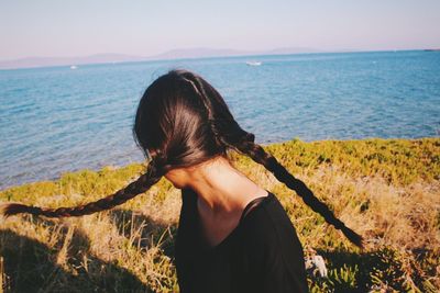 Young woman on seashore