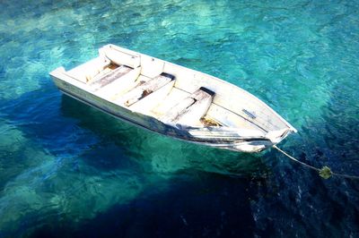 High angle view of sailboats moored in sea