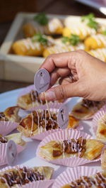 Midsection of woman preparing food