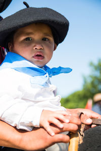 Close up of argentinian boy with traditional clothing