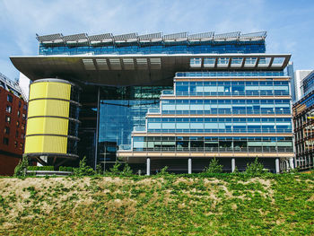 Low angle view of modern building against sky