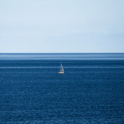 Boat sailing in sea