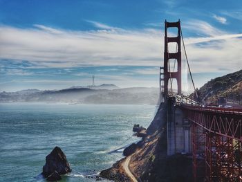 View of suspension bridge over sea