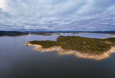 Drone aerial view of idanha dam marechal carmona landscape with beautiful lake water, in portugal