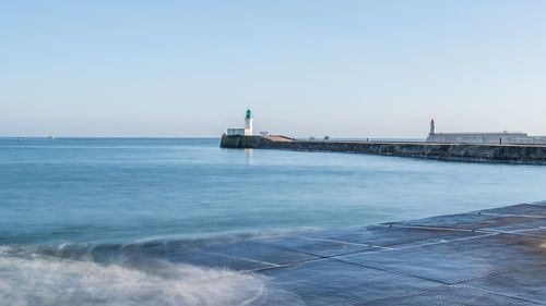 Scenic view of sea against clear sky