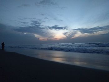 Scenic view of sea at sunset