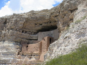 Low angle view of old ruins against sky