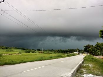 View of road against cloudy sky