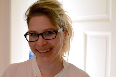 Portrait of smiling woman at home