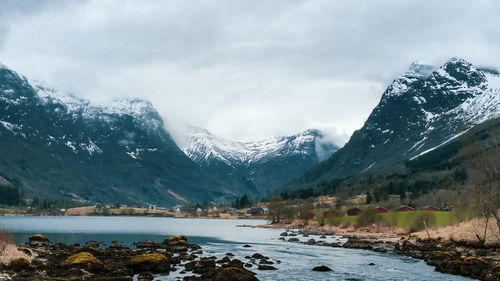 Scenic view of snowcapped mountains against sky