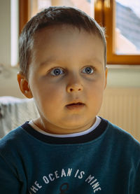 Close-up portrait of boy looking away