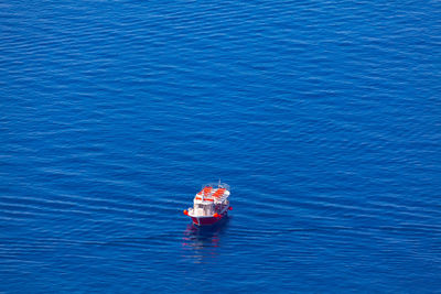 Ship surrounded by water . boat on the blue sea