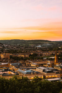 High angle view of buildings against sky during sunset