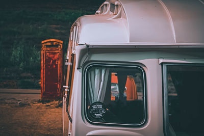 Reflection of car on side-view mirror