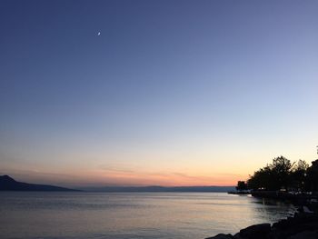 Scenic view of sea at sunset