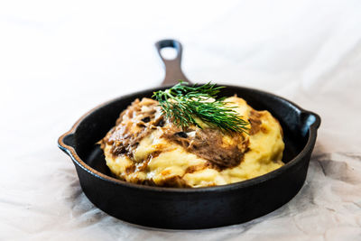 Close-up of food skillet on table