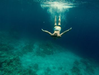 Man swimming in sea