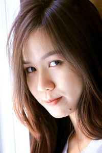 Close-up portrait of beautiful young woman
