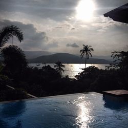 Scenic view of sea against cloudy sky