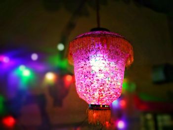 Close-up of illuminated light bulb