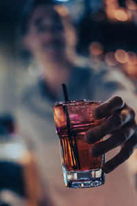 Close-up of illuminated drink vodka cranberry