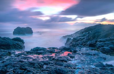 Scenic view of sea against sky during sunset